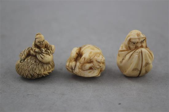 Eight Japanese ivory netsuke and four other items, late 19th / early 20th century,
